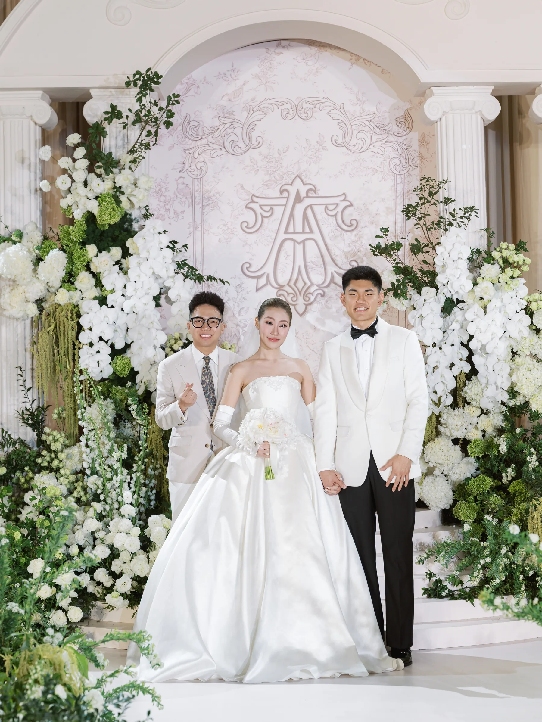 Sơn Tùng with Tuệ Anh and Tatsumi at their wedding